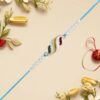 Elegant Leaf Design Rakhi with Pearl Beads and Blue Thread – Colorful Raksha Bandhan Rakhi for Brother