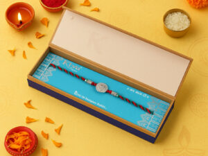 925 Silver Rakhi with Round Coin-Style Textured Motif on Red-Green Braided Thread – Premium Single Designer Rakhi